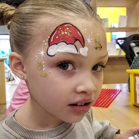 Christmas Face Painting Reindeer, Small Christmas Face Paint Ideas, Santa Hat Face Paint, Kids Christmas Makeup, Easy Christmas Face Painting For Kids, Kids Easy Face Painting Ideas, Easy Face Painting Ideas For Kids Christmas, Easy Winter Face Painting, Santa Face Painting