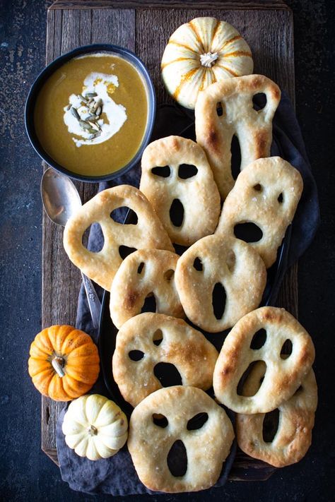 Fun No-knead Ghost Fougasse for Halloween made with easy no-knead dough.  These fun ghost-shaped fougasses are crisp on the outside and soft on the inside.  This dough is very similar to the no-knead crusty bread dough but it has the addition of a bit of sugar and olive oil.  I think you're going to love how fast and easy this recipe is.  Perfect for dunking into a warming cup of soup on a chilly night. #nokneadough #crustybread #halloween #simplysogood Fun Halloween Treats, Cup Of Soup, Spooky Food, Holiday Sweets, Halloween Recipe, Halloween Dinner, No Knead, Halloween Snacks, Halloween Food For Party