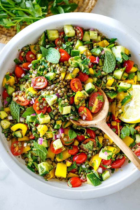 This Mediterranean-inspired lentil salad recipe is easy to make and bursting with summer flavor! Cold and refreshing, it's made with simple ingredients in just 30 minutes. Vegan and Gluten-free. Mediterranean Lentil Salad, Blueberry Margarita, Lentil Salad Recipes, Feasting At Home, French Green Lentils, Gluten Free Salads, Pomegranate Salad, Quinoa Healthy, Lentil Salad