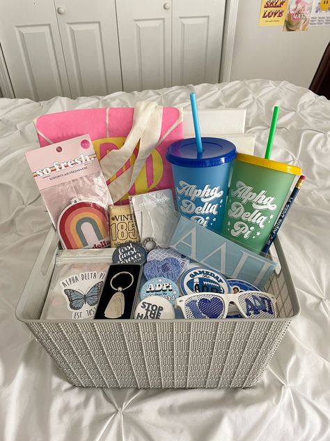 big little basket ideas adpi gifts sorority canvas Sorority Goodie Bags Gift Ideas, College Bday Gifts, Bid Day Baskets Gift Ideas, Big And Lil Gift Ideas, Sorority New Member Gifts Bid Day, Big Sis Little Sis Gifts Sports, Basket Ideas Sorority, Bid Day Baskets Sorority, Cute Big Little Gifts