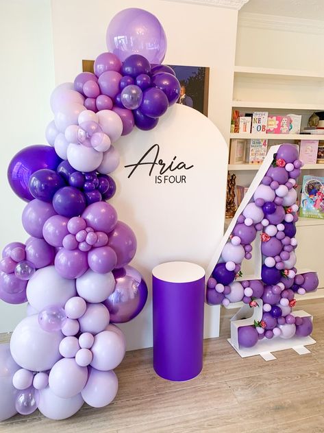 We created this purple balloon set up for Aria's 4th birthday. Contact us today to book your event decor Purple Theme Party, Purple Birthday Decorations, New Year Party Decorations, Lila Party, Purple Party Decorations, Purple Birthday Party, Event Stylist, New Year's Party Decorations, Purple Theme