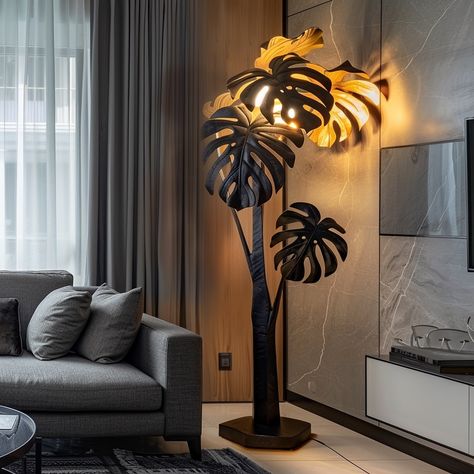 Illuminate your living space with this exquisite Monstera-inspired corner lamp. The sleek frame, adorned with intricate monstera leaf patterns, casts beautiful shadows, creating a serene oasis. The soft, warm LED glow offers a cozy ambiance, perfect for relaxing evenings. With a sturdy base and adjustable height, this lamp enhances any corner with botanical charm and contemporary style. Conceptual AI Art Follow @ecosapiens for more! Corner Lamp, Leaf Patterns, Cozy Ambiance, Monstera Leaf, Leaf Pattern, Contemporary Style, Home Interior Design, Oasis, House Interior