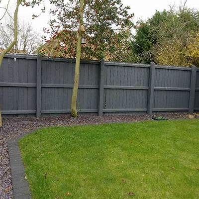 grey fences - Yahoo Search Results Grey Backyard Fence, Green Fencing Ideas, Dark Grey Fence Garden, Grey Fence Garden Ideas, Gravel Fence Border, Grey Fence Garden, Grey Fence Paint, Dark Grey Fence, Garden Fence Colours