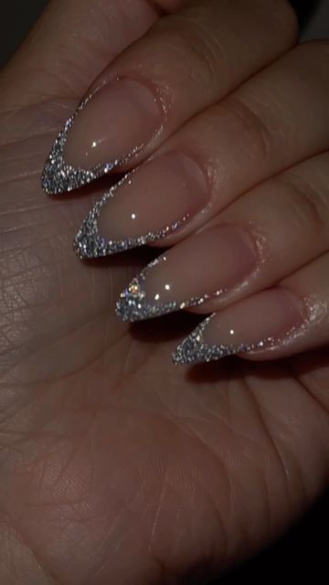 Desteny J on Instagram: "Reflective glitter is so captivating 😍 • • • • • • • #nails #nailvideos #glitternails #frenchtipnails #sparkle #naildesigns #nailinspo" Silver Sparkle Nails French Tip, Silver Glitter French Tips Almond, Sliver Homecoming Nails, Glittery Nails Silver, Reflected Glitter Nails, Disco French Nails, Sparkly Classy Nails, Sparkle Almond Nails Glitter, Silver Party Nails