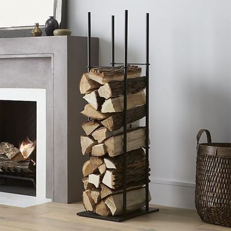 This steel log holder maximizes vertical space, storing firewood in a slim stack beside your hearth. Its no-frills, open build and four divider bars keep the presentation neat. Scandi Cottage, Indoor Firewood Rack, Organized Ideas, Firewood Storage Indoor, Firewood Racks, Fireplace Room, Fireplace Heat, Fireplace Wood, Firewood Logs