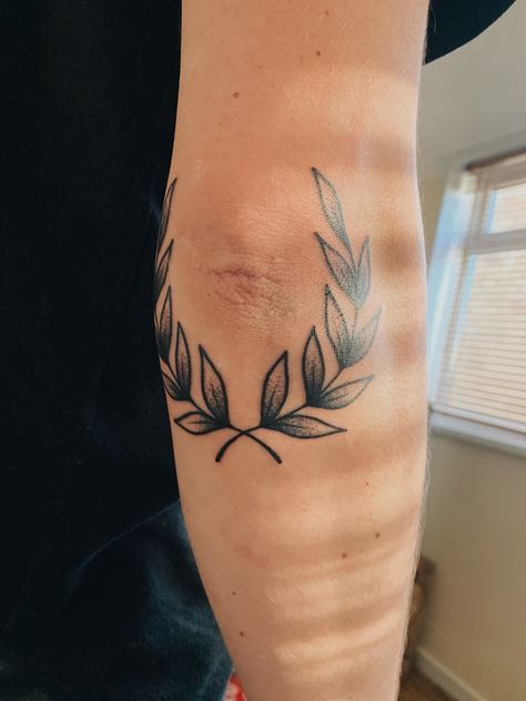 Olive Branch Leg Tattoo Men, Laurel Wreath Tattoo Elbow, Wreath Elbow Tattoo, Leaves Elbow Tattoo, Traditional Laurel Tattoo, Olive Wreath Tattoo Men, Leaf Elbow Tattoo, Olive Branch Elbow Tattoo, Vine Elbow Tattoo