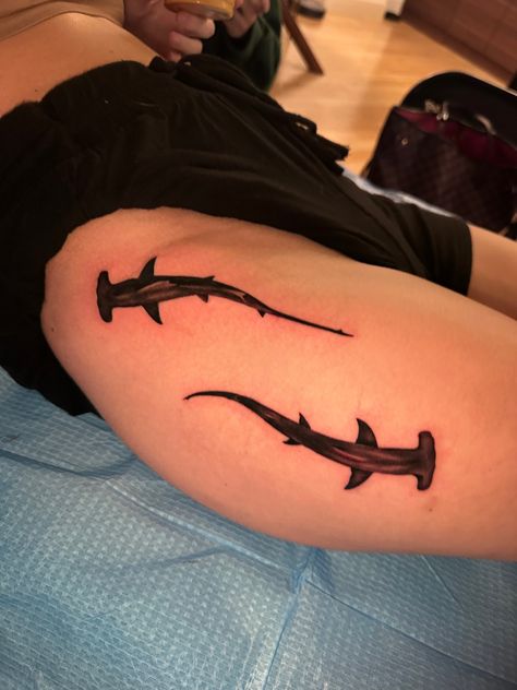 Shark tattoo on thigh Shark Around Knee Tattoo, Shark Leg Tattoos Women, Overhead Shark Tattoo, Shark Semicolon Tattoo, Whale Shark Hip Tattoo, Shark Cover Up Tattoo, Dark Shark Tattoo, Hip Shark Tattoo, Shark Tramp Stamp