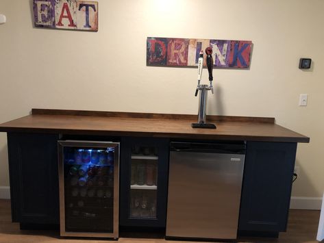 We used Ikea cabinets and a Lowe‘s butcher block. #diy #homebar #kegerator #gameroom Kegerator Cabinet Diy, Dry Bar With Kegerator, Built In Kegerator Home Bars, Kegerator Bar Ideas, Fridge Bar Cabinet, Butcher Block Diy, Diy Dry Bar, Kegerator Cabinet, Outdoor Kegerator