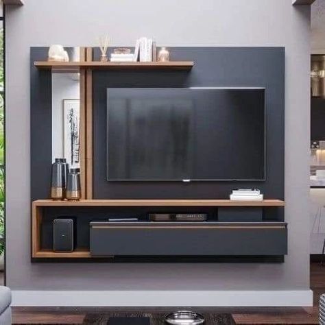 Tv Unit Design idea ✨️ #trendingpost #homedecor #interiordecorating #livingroomdesigns #interiors #reelitfeelit #tvunitdesigns #homedesignsdworld #interior #tvunit #livingroomdesign #wallpanels #interiordesign #fypシ゚viralシ2024fyp #dailylifehacks #easydiy #gardeningtips #housedecoration #dailywear Tv Kastenwanden, Modern Tv Unit Designs, Wall Unit Designs, Tv Unit Furniture Design, Modern Tv Wall Units, Tv Unit Decor, Tv Stand Decor, Tv Unit Furniture, Tv Cabinet Design