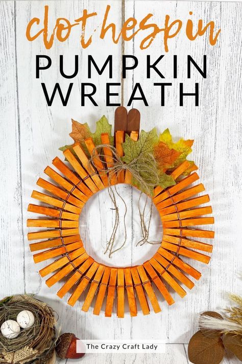 If you're looking for a unique way to decorate your front door this fall, consider making a Clothespin Pumpkin Wreath. It uses Dollar Store supplies and is super easy to make. Fall Button Wreath, Diy Crafts For Seniors Citizens, Wreath Fall Diy, Fall Clothes Pin Wreaths, Fall Clothespin Wreath Diy, November Crafts For Senior Citizens, Clothespin Wreaths Ideas, October Crafts For Senior Citizens, Fall Clothespin Wreath