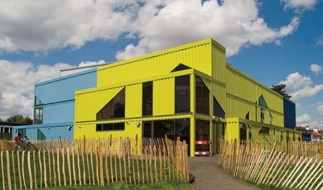 The idea of using recycled shipping containers is becoming a growing trend as the crates are strong, efficient and inexpensive materials.  We’ve... Boathouse Ideas, High School Building, Container Construction, Cargo Container Homes, Shipping Container Architecture, Shipping Container Cabin, Used Shipping Containers, Sports Hall, Container Cabin