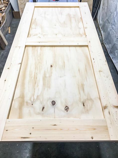 Nail 1x6 boards to the perimeter and middle of the plywood backing to create your barn door. Build A Barn Door, Plywood Door, Pallet Deck Diy, Plywood Diy, Building A Barn Door, Diy Sliding Barn Door, Textured Panels, Woodworking Supplies, Diy Barn Door