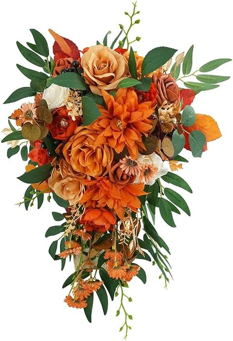 Size: 17.72 inches high, 11 inches in diameter. Materials: made of burnt orange peonies, cream roses, burgundy roses,terracotta roses, green leaves, orange daisy, brown eucalyptus and ribbons. These fake flowers and fake greens are handmade with bright colors, elegant shapes and realistic appearance. They will not wither in a short time during the wedding like real flowers, and will not fade, can stay beautiful forever. Rust Flower Bouquet, Hanging Bridal Bouquet, Bride Bouquets Fall, Tiger Lily Wedding Bouquet, Orange And Green Bouquet, Fall Wedding Bouquets October, Wedding Bouquets Orange, Terracotta Roses, Fall Bridal Bouquet October