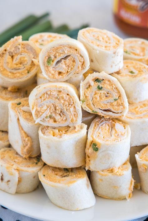 Buffalo chicken pinwheels are a quick and easy appetizer packed with bold Buffalo flavor. Roll up the spicy chicken filling, chill, and slice! Pinwheel Appetizer, Buffalo Chicken Pinwheels, Buffalo Chicken Rolls, Simply Happy Foodie, Chicken Pinwheels, Tortilla Pinwheels, Buffalo Chicken Wraps, Easy Buffalo Chicken, Pinwheel Appetizers