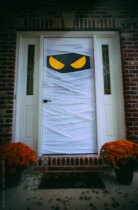 Stocksy United – Royalty-Free Stock Photos – Spooky Halloween Door ... Halloween Decorations Front Door, Mummy Door, Door Decorations Halloween, Front Door Halloween Decor, Porta Halloween, Halloween Doors, Halloween Front Doors, Diy Halloween Decor, Adornos Halloween