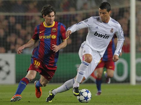 Lionel Messi-Christiano Ronaldo. FC Barcelona's Lionel Messi, left, vies for the ball against Real Madrid's Cristiano Ronaldo during a 2011 game at Camp Nou in Barcelona.Andres Kudacki/AP Photo France National Football Team, Messi Pictures, Cristiano Ronaldo Quotes, Cr 7, Cr7 Vs Messi, Messi Vs Ronaldo, Cristiano Jr, Ronaldo Quotes, Real Madrid Cristiano Ronaldo