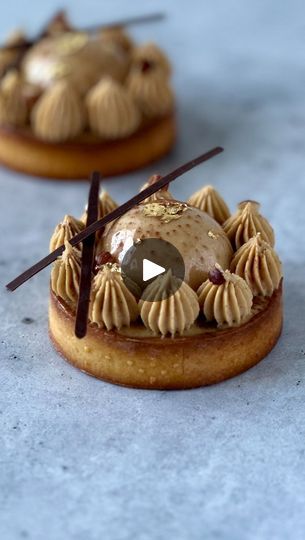 102K views · 15K reactions | (Recipe) Hazelnut and Caramel Chocolate Tartlets - Happy Monday, friends! these tartlets are filled with a delicate & smooth hazelnut and caramel cream! It’s a dream. Grab the recipe 👇🏼 

Composition:
> Shortcrust (pate sucrée), recipe in my blog. Link in bio. 
> Hazelnut and caramel cream.
> Salted caramel
> Chocolate sponge 
> Hazelnut praliné 

@nycake baking tools and mold 

HAZELNUT CARAMEL CREAM
• 200g milk
• 2 vanilla beans
• 250g Blond chocolate
• 4g gelatin powder, 160 bloom. Hydrated in cold water, 6 times its weight. 
• 150g hazelnut praliné, recipe in the comments 
• 300g heavy cream 36%, cold
• Pinch of salt

- Bloom the gelatin in cold water 
- Bring the milk to a boil with the vanilla bean, pour over the chocolate
- Emulsify by mixing, add the Chocolate Tartlets, Gelatin Powder, Hazelnut Praline, Caramel Cream, Caramel Creams, Vanilla Beans, Salted Caramel Chocolate, Chocolate Sponge, Caramel Chocolate