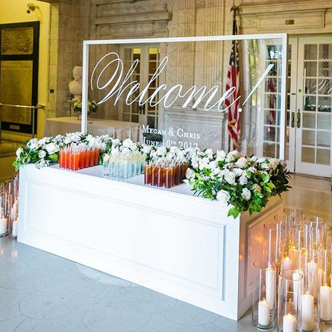 Welcome guests in style! Today’s DAR wedding by @bellwetherevent created a fun welcome drink entrance with @reveventpro @occasionscaterers as their guests arrived for the ceremony! Photos @roephoto / florals @lynnvalestudios / tap for more vendors! . . . . #darwedding #daughtersoftheamericanrevolution #dcwedding #dcweddings #dcweddingplanner #welcomecocktail #welcomedrink #signaturecocktail #cocktailbar #welcome #makeanentrance #makinganentrance #bigday #weddingdecor #ceremonydesign  #Regram via Wedding Welcome Table, Welcome Table, Falls Church, Glamorous Wedding, Wedding Cocktails, Reception Decor, Sign Wedding, Wedding Reception Decorations, Wedding Sign