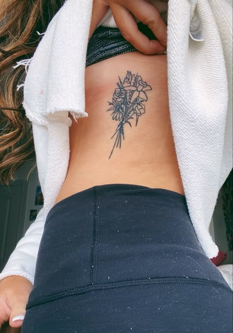 tattoo flowers dainty Bouquet Hip Tattoo, Flower Bouquet On Ribs Tattoo, Birth Flower Bouquet Tattoo Ribs, Flower Bouquet Tattoo On Side, Rib Flower Bouquet Tattoo, Bouquet Of Flowers Tattoo Ribs, Bouquet Rib Tattoo, Birth Flower Bouquet Tattoo Placement, Bouquet Tattoo Ribs