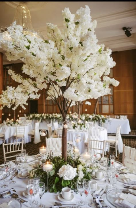 Faux Cherry Blossom Tree Wedding, Floral Tree Centerpieces Wedding, Tall Tree Centerpieces Wedding, White Blossom Trees Wedding, Cherry Blossom Tree Centerpieces, Cherry Blossom Wedding Centerpieces, Tree Centerpieces Wedding, White And Burgundy Wedding, Tree Centrepiece Wedding