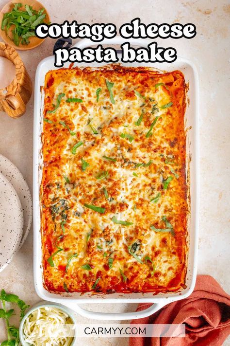 Made with only a handful of ingredients, this super simple cottage cheese pasta bake is a cheesy, delicious casserole that the whole family will love. Loaded with tender pasta, cottage cheese, marinara sauce, spinach, basil, and garlic, then topped with melted mozzarella, this pasta casserole is sure to have everyone reaching for seconds. Loaded Baked Spaghetti With Ricotta, Ravioli Casserole With Cottage Cheese, Lasagna Casserole With Cottage Cheese, Spaghetti Sauce With Cottage Cheese, How To Make Pasta Bake, Cottage Cheese Spaghetti Bake, Pasta Bake Cottage Cheese, Tomato Cottage Cheese Pasta, Baked Ziti With Ground Beef And Cottage Cheese