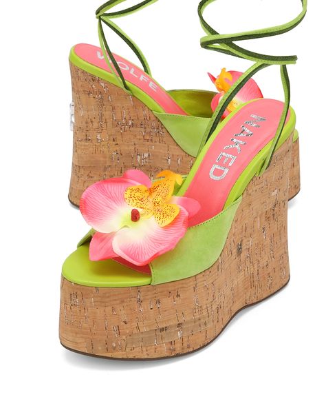 Product Description Sunflower our brand new wedged heel with a peep toe design perfect to complete a summer look. This style has a super cute soft green suede upper design with a striking pink flower, Summery ankle tie with a beaded finish to match and a Glitter cork wrap featuring the famous wolfe head plaque on the heel. Features 140mm heel height 60mm platform height 100% suede upper Suede soft leg tie Beaded tie finish Flower centre piece Leather lining Cork wedge cover Full leather insole f Platform Summer Shoes, Pink And Green Shoes, Wedged Heel, Beaded Tie, Heel Wedges, Naked Wolfe, Pink Wedges, Wedges Heels, Icon Shoes