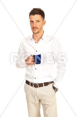 Confident man holding cup of coffee Stock Photos #AD ,#holding#man#Confident#cup Holding A Mug Reference Drawing, Holding Mug Pose Reference, Person Holding Coffee Reference, Holding Coffee Reference, Person Holding Mug Reference, Holding Cup Pose Reference, Person Holding Cup Reference, Holding Coffee Pose Reference, Person Holding Drink Drawing Reference