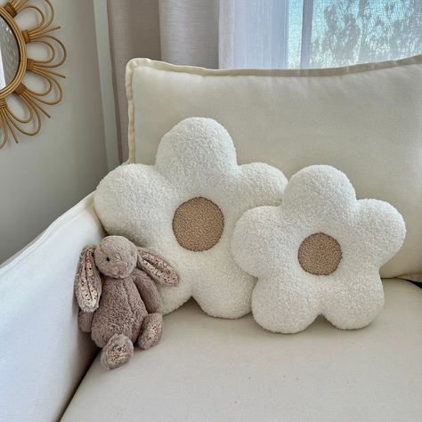 Our handmade Daisy flower cushions are perfect for decorating nurseries, children's rooms, teen rooms or even add a touch of character to your sofa or armchair. They are made from a Teddy fleece fabric which is very on trend with the boucle look, adding a textured feel to any room. The Daisy pillows are super soft and plush and available in a wide range of colours to suit your decor.  Small cushion is approximately 26cm Large cushion is approximately 34cm Cleaning: Spot-clean with warm soapy wat Nursery Sofa, Sage Room, Graces Room, Daisy Cushion, Decorate Nursery, Comfy Room, Unique Nursery Decor, Daisy Pillows, Bed Comforter