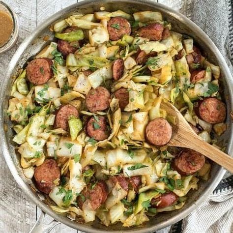 If you need a fast and easy weeknight dinner that is filling, flavorful, and low carb, this Kielbasa and Cabbage Skillet has you covered. BudgetBytes.com Keto Cabbage Recipe, Sausage And Cabbage, Fried Cabbage With Sausage, Kielbasa And Cabbage, Smoked Sausage Recipes, Cabbage And Sausage, Cabbage Casserole, Fried Cabbage, Keto Recipes Dinner