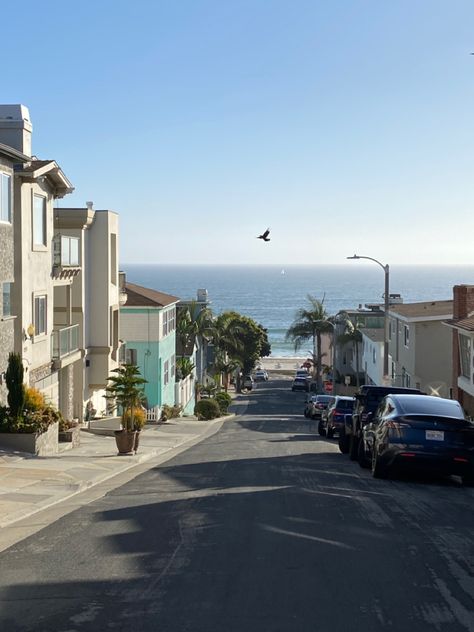 manhattan beach, ca Socal Beach House, Coastal Beach Town Aesthetic, Manhattan Beach California Houses, Living In A Beach Town, Beach Town Houses, Summer Beach Town Aesthetic, Beach House Neighborhood, Manhattan Beach Aesthetic, Cali Beach Aesthetic