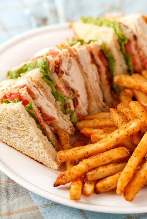 Indulge in the timeless flavors of a Classic American Club Sandwich, a true delight for sandwich lovers. This recipe from CDKitchen brings together layers of crisp bacon, juicy turkey, fresh lettuce, and ripe tomatoes, all nestled between perfectly toasted bread. Perfect for lunch or a casual dinner, this club sandwich offers a satisfying crunch and a burst of savory goodness in every bite. Whether you're hosting a gathering or enjoying a quiet meal at home, this classic dish is sure to impress and satisfy. Club Sandwich Recipe, Club Sandwich Recipes, Recipes Using Rotisserie Chicken, Recipes Using Ground Beef, Juicy Turkey, Turkey Club, Sandwich Platter, American Club, Meal Train Recipes