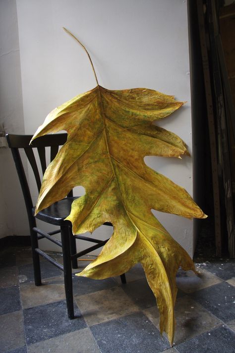 Paper Mache Outdoor Garden Art, Giant Leaves, Paper Mache Leaf, Paper Mache Props, Giant Leaves Diy, Nature Decorations Party, Paper Mache Leaves, Paper Flower Sculpture, Giant Paper Leaves