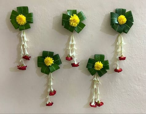 #pooja #flowers #mango #leaf Ashok Leaves Decoration, Palkhi Decoration, Mango Leaves Decoration Indian, Diwali Lakshmi Pooja Decoration Ideas, Mango Leaf Decorations, Sathyanarayana Pooja Decoration At Home, Pooja Background Decoration, Pooja Photography, Mango Leaf Toran