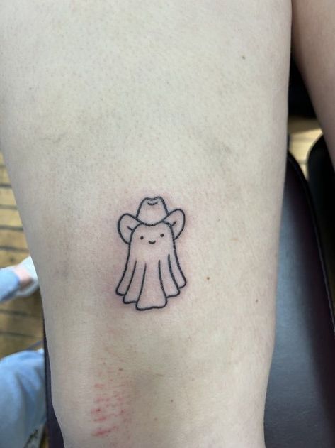 Very Simple Tattoos For Women, Simple Fall Tattoos, Ghost With Headphones Tattoo, Creepy Small Tattoos, Ghost With Cowboy Hat Tattoo, Tiny Spooky Tattoos, Ghost Cowboy Tattoo, Fine Line Ghost Tattoo, Minimalist Ghost Tattoo