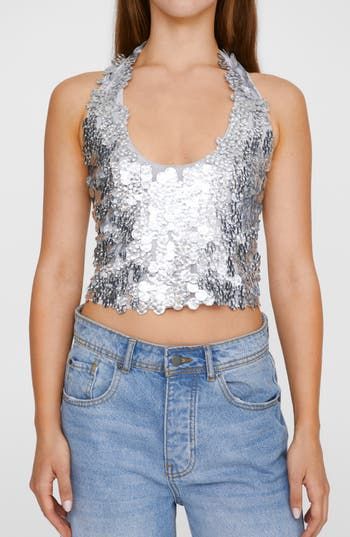 Ultrasparkly paillettes add a futuristic-glam feel to this halter top that'll have all eyes on you at the next party. Exclusive retailer 9" center front length (size Medium) Back button-and-loop closure Halter neck Lined 100% polyester Hand wash, line dry Imported Chiffon Crop Top, Silver Sequin Top, Sequin Halter Top, Swimsuit Skirt, Sequin Halter, Sequin Crop Top, Halter Crop Top, Lingerie Romper, All Eyes