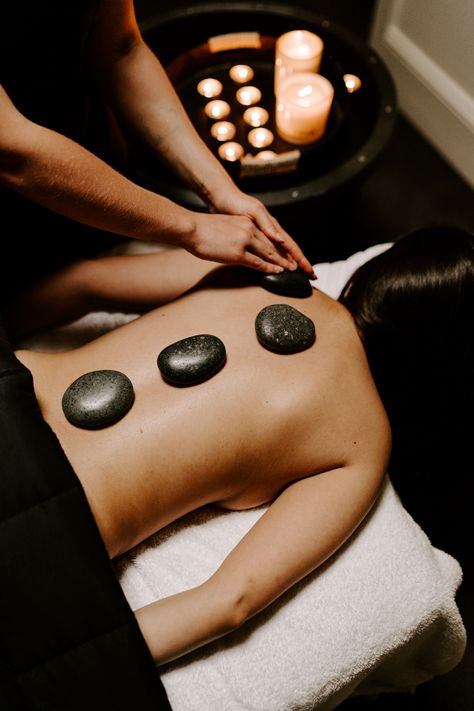 Hot stone massage at Body Sanctum Day Spa in Queenstown, New Zealand. Massage Therapy Photoshoot, Massage Therapist Photoshoot Ideas, Massage Therapist Photoshoot, Massage Photoshoot Ideas, Massage Therapist Aesthetic, Massage Therapy Aesthetic, Spa Photoshoot, Massage Therapy Career, Esthetician Spa