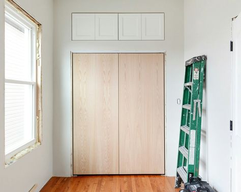 Using space above closet door/ access area inside top of closet ie: wasted space Tiny Nursery, Closet Door Makeover, Closet Planning, Yellow Brick Home, Narrow Rooms, Laundry Room Cabinets, Swinging Doors, Brick Home, Cabinet Style