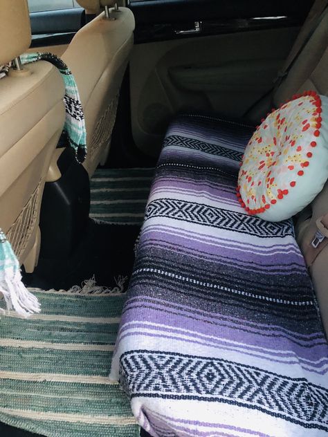 Got the blankets on amazon $15!! Pillow at target for $5!!! Floor Rugs @ World Market!!! $10! Car Backseat Pillows And Blankets, Car Pillows Aesthetic, Car Decor Backseat, Car Rugs Vehicles, Boho Car Ideas, Tapestry In Car Roof, Car Blanket Aesthetic, Car Accessories Aesthetic Boho, Aesthetic Truck Interior