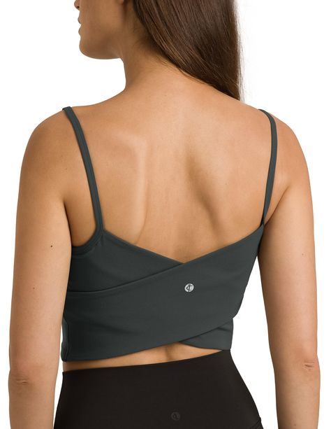 PRICES MAY VARY. Dreamlux fabric incorporates LYCRA fiber, provides outstanding stretch for unrestricted movement, combining sophistication with softness and breathability for enhanced overall comfort. Featuring a built-in shelf bra with removable padding, this design prioritizes functionality and comfort, offering personalized support and ease. Crisscross back design extends coverage. Pairs effortlessly with leggings and is equally stylish on its own. Designed for yoga, ensuring optimal support Yoga Tops For Women, Bra Workout, Sports Aesthetic, Lounge Lingerie, Workout Yoga, Crop Tank Top, Yoga Tops, Sports Top, Workout Jacket