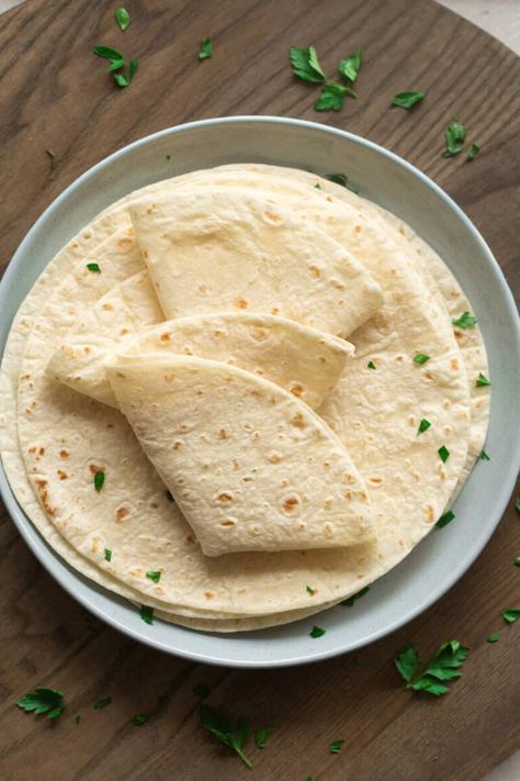 These keto tortillas are made with almond flour and have a soft and pliable texture, you won't believe how easy they are to make! Made with just 3 main ingredients, these wraps are perfect as sandwiches, quesadillas, pizzas, and more! 2 grams net carbs per serving. Keto Tortilla Wraps Recipe, Psyllium Husk Tortillas, Psyllium Husk Wraps, Keto Wrap Recipes, Almond Flour Tortillas 3 Ingredients, Keto Burrito Wrap, Keto Wraps Low Carb, Low Carb Wraps Recipe, Keto Wraps Recipes