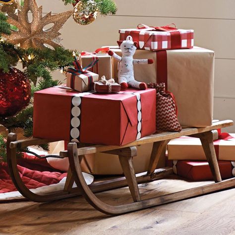 Wooden sleigh to hold Christmas presents Outdoor Christmas Presents, Christmas Sled Decoration, Christmas Sleigh Decorations, Sled Decor, Christmas Parade Floats, Christmas Coffee Table Decor, Wooden Sleigh, Lights For Christmas, Whoville Christmas