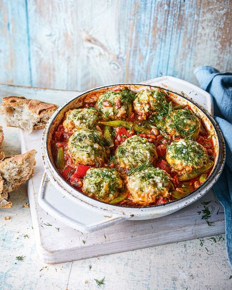 Greek-style casserole with courgette dumplings | delicious. magazine Greek Recipes, Delicious Magazine, Fritter Recipes, Midweek Meals, Veggie Dishes, Meat Free, Vegetarian Dishes, Veggie Recipes, Dumplings