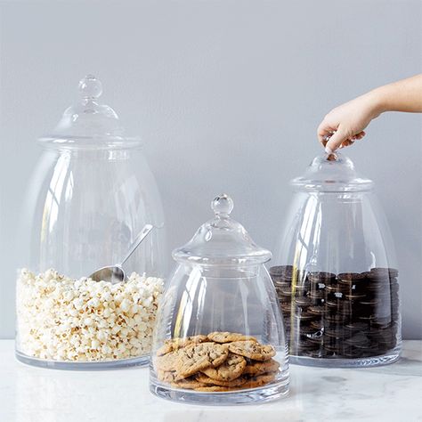 Showcase sweets and treats in a beautiful Bon Bon Jar. A node to their French name, this glass jar is the perfect vessel to display candy, desserts, fruit, or even household supplies. A key element for storage and organization, each jar is adorned with their own unique top. French Name, Jar Display, Candy Display, Glass Apothecary Jars, Clear Glass Jars, Glass Canisters, Unique Top, Utila, Jar Vase