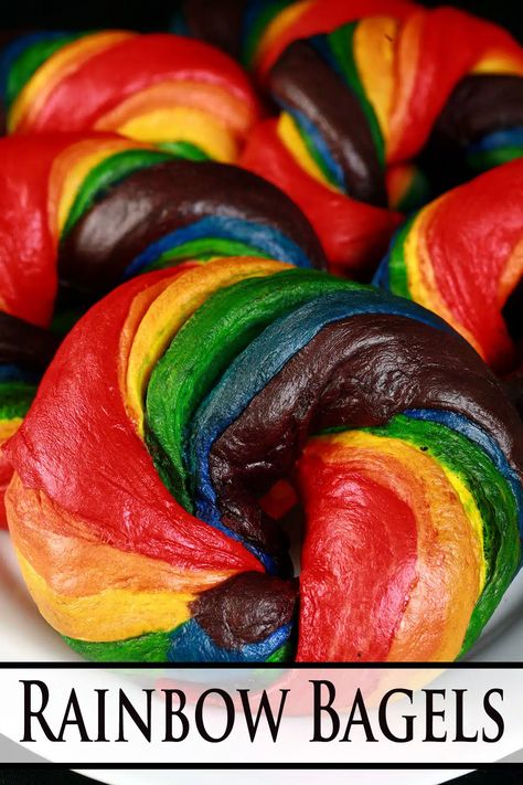 A platter of brightly coloured homemade rainbow bagels. Rainbow Bagel Recipe, Pride Brunch, Ukrainian Easter Bread, Rainbow Bagels, Bagel Recipes, Rainbow Baking, Minnesota Food, Bagels Recipe, Ukrainian Easter