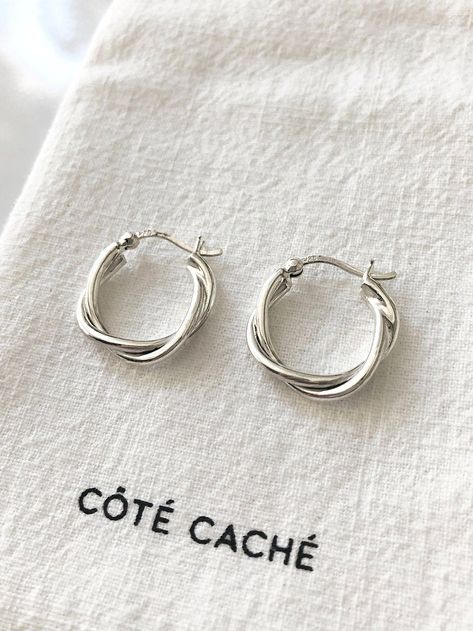 Relaxed Braid Hoop Earrings, by Côté Caché. Braided Hoops with a more relaxed feel. Less turns around the core mean a less busy impression, for a laid back alternative to traditional hoops.   ✦ Material : Sterling Silver ✦ Dimensions : W21mm X L21mm X T3.8mm (This is for Silver. Check our shop for the Gold version) ✦ Gift box included. ✦ Free UK Postage on orders over £49. ✦ International postage available. Reveal your hidden side, with Côté Caché. ~ Every Côté Caché piece is exclusively designe Hoop Earrings Aesthetic, Earrings Aesthetic, Spiral Earrings, Jewellery Uk, Large Earrings, Earrings Collection, Earrings Sterling Silver, Jewelry Earrings Hoops, Pearl Drop Earrings