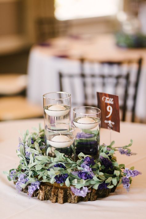 Fall Purple Centerpieces, Lavender Wedding Centerpiece, Lavender And Dark Purple Wedding, Rustic Lavender Centerpieces, Candle Flowers Centerpieces, Lavender And Sage Wedding Table Settings, Lavender And Greenery Wedding Decor, Lavender And Lilac Wedding Centerpieces, Lavender Sage Silver Wedding