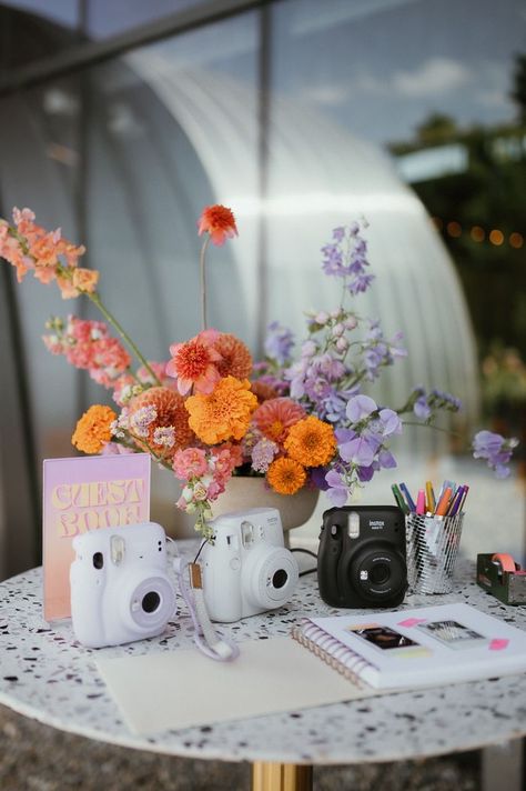 Polaroid photo guest book | Image by Hennygraphy Polaroid Event Ideas, Guest Polaroid Book, 90s Wedding Decorations, Together Journal Wedding, Wedding Guest Polaroid, Polaroid Camera At Wedding, Eclectic Wedding Inspiration, Poloroid Photobooth Ideas, Modern Colorful Wedding Decor