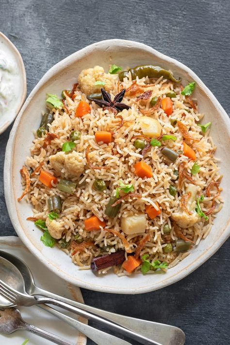 Close up shot of mix veg pulao or vegetable pulao on white ceramic plate. Veg Pulao Photography, Pulav Rice Photography, Rice Pulao Indian, White Pulao Recipe, Pulao Recipe Vegetables, Veg Pulao Recipe Indian, Pulao Photography, Punjab Recipes, Vegetable Rice Recipes