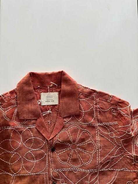 Burnt orange linen shirt, echoing warmth and texture of terracotta tiles Hand-embroidered | Linen On model: Cuban collared, size L NOTE: Each hand embroidered is unique and may slightly differ from the images shared. Embroidery Men’s Shirts, Embroidery Jacket Men, Unique Shirt Designs For Men, Embroidered Mens Shirt, Unique Hand Embroidery Designs, Shirt Embroidery Ideas, Mens Embroidered Shirt, Hand Embroidered Shirts, Embroidery Tshirts