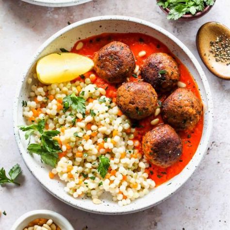 Moroccan Lentil Meatballs with Roasted Red Pepper Sauce - Dishing Out Health Moroccan Lentil, Couscous Dishes, Moroccan Meatballs, Dishing Out Health, Veggie Meatballs, Lentil Meatballs, Meal Prep Lunch, Roasted Red Pepper Sauce, Prep Lunch